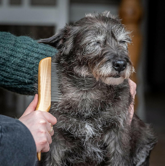 Mikki Bamboo Shedding Anti-Tangle Comb - bamboo comb with mixed tooth spacing, rotating pins.